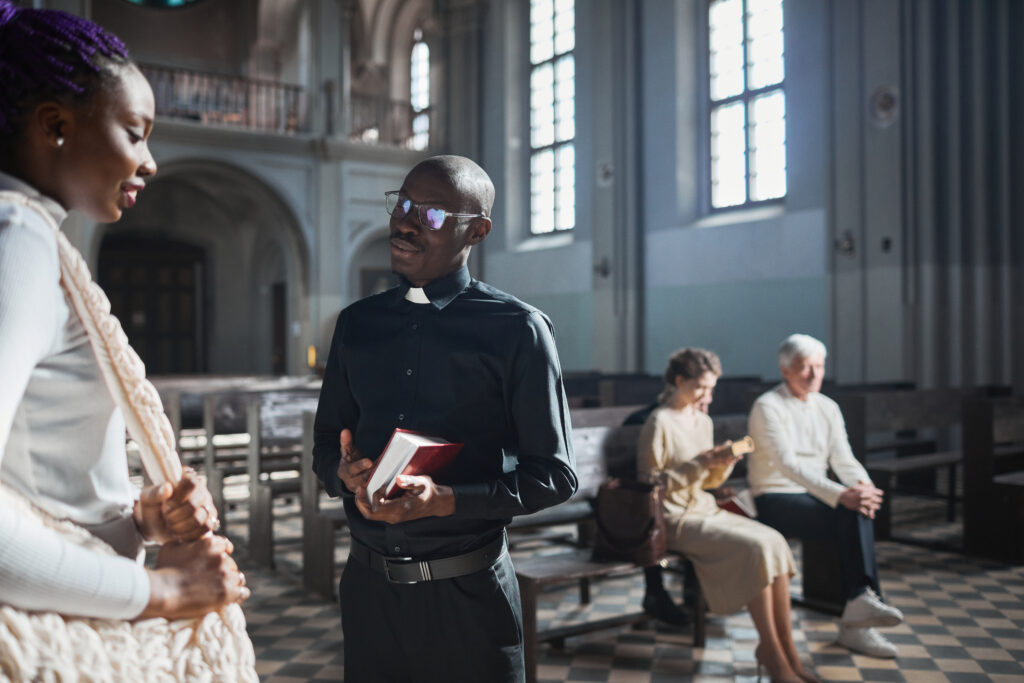 People having a discussion inside a church
